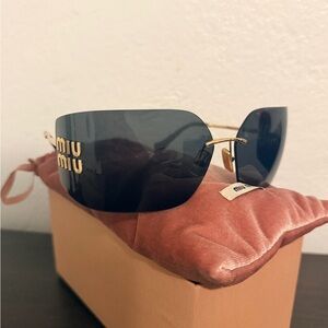 Miu Miu Aube Black Lensed Rimless Sunglasses with Gold Logo 100% Authentic.